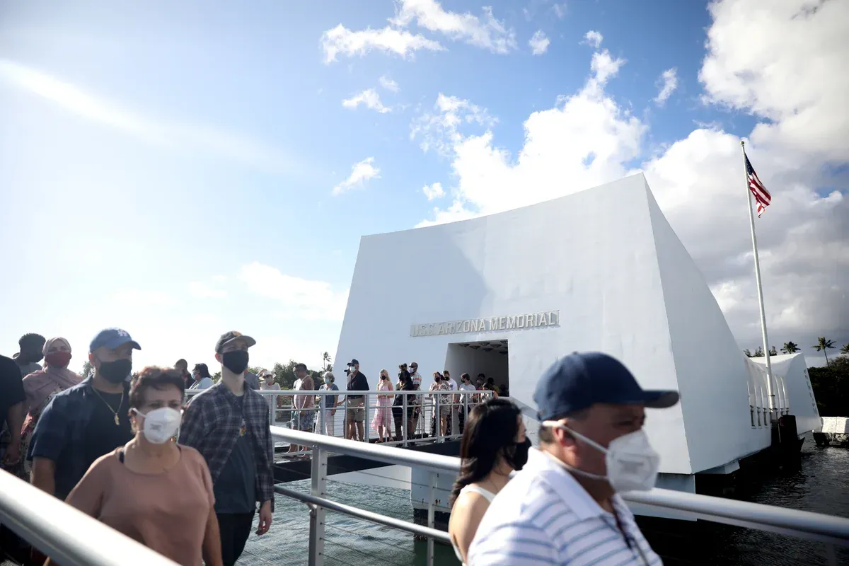Visitors at the USS Arizona Memorial entrance on a Pearl Harbor tour